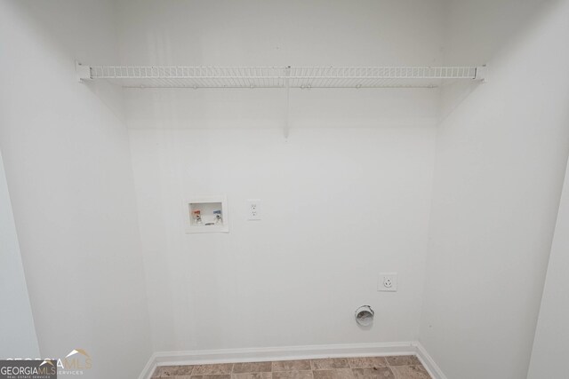 460 Mckneely Rd, Griffin, GA 30224 - laundry area featuring hookup for an electric dryer, baseboards, and hookup for a washing machine