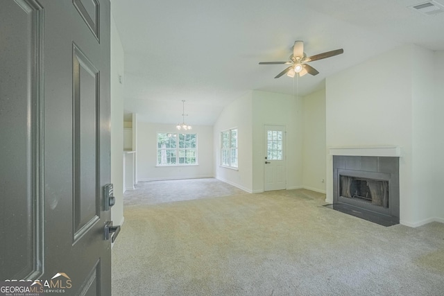 460 Mckneely Rd, Griffin, GA 30224 - unfurnished living room with visible vents, carpet floors, lofted ceiling, a tile fireplace, and baseboards