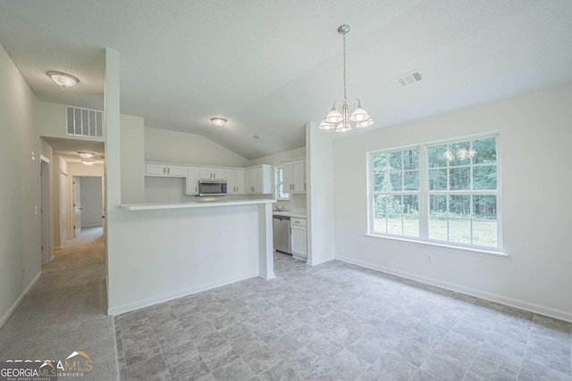 460 Mckneely Rd, Griffin, GA 30224 - kitchen featuring a notable chandelier, white cabinetry, visible vents, and stainless steel appliances