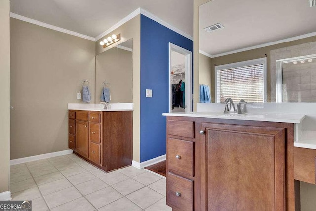 bathroom with two vanities, baseboards, and visible vents