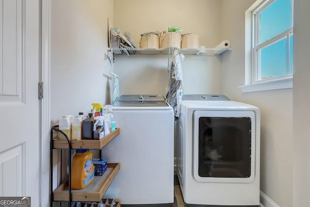 laundry room featuring washer and clothes dryer and laundry area