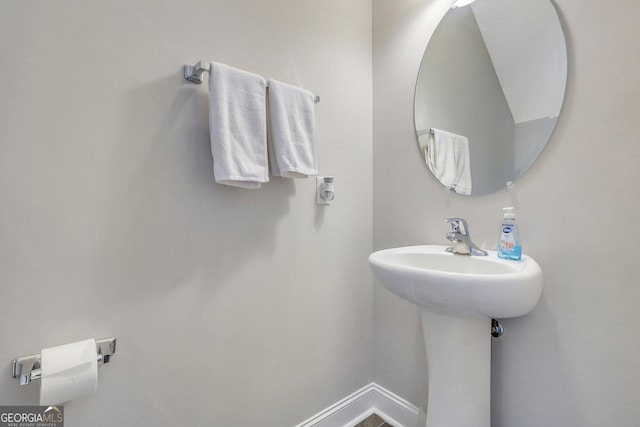 bathroom featuring baseboards