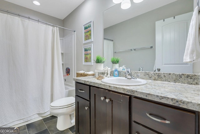 full bathroom featuring toilet, vanity, and shower / bath combination with curtain