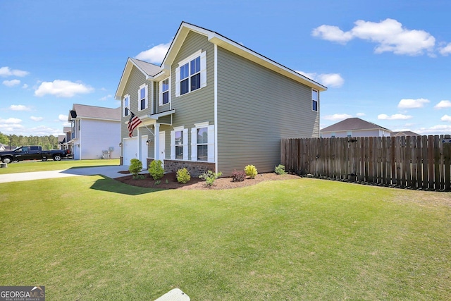 view of side of property featuring a yard, a garage, fence, concrete driveway, and brick siding