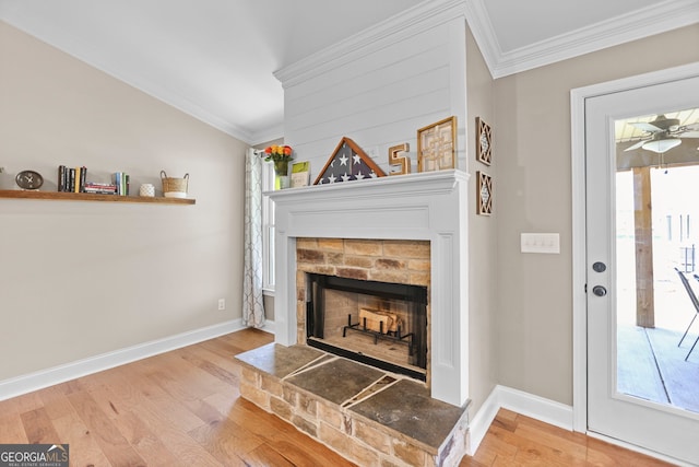 75 Flagstone Dr, Newnan, GA 30263 - detailed view of ornamental molding, a fireplace with raised hearth, and wood finished floors