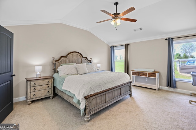 75 Flagstone Dr, Newnan, GA 30263 - bedroom featuring light colored carpet, vaulted ceiling, ceiling fan, and ornamental molding