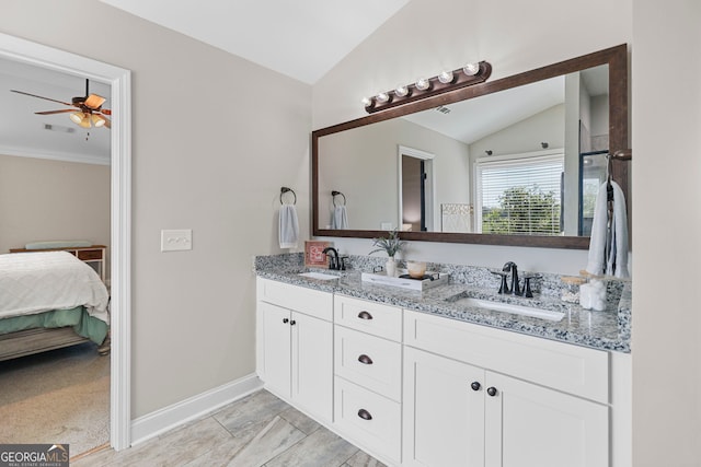 75 Flagstone Dr, Newnan, GA 30263 - full bath featuring vaulted ceiling, double vanity, ceiling fan, and connected bathroom