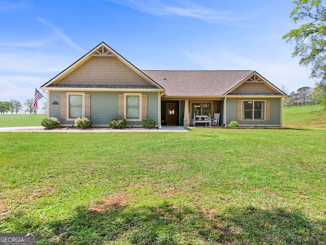75 Flagstone Dr, Newnan, GA 30263 - view of front of property featuring a front yard and roof with shingles