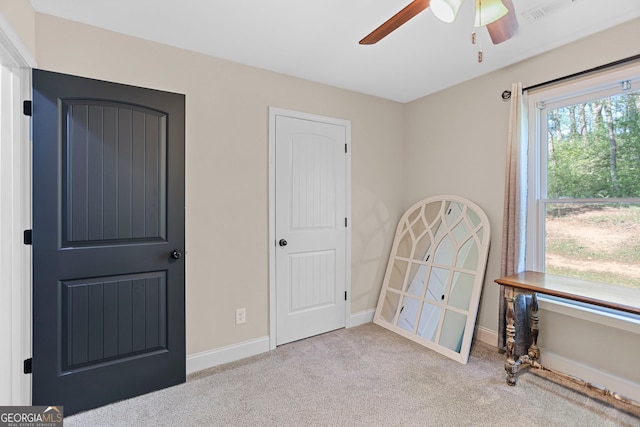 75 Flagstone Dr, Newnan, GA 30263 - unfurnished bedroom with carpet and ceiling fan
