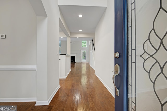 entrance foyer featuring hardwood / wood-style flooring, baseboards, and recessed lighting