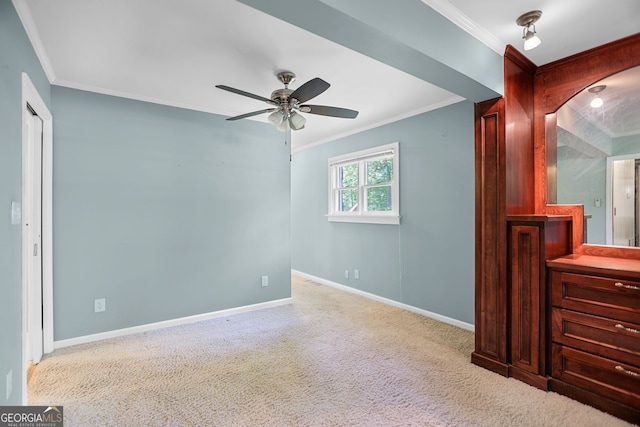 482 E Lake Rd, Mcdonough, GA 30252 - unfurnished bedroom featuring carpet flooring, crown molding, and baseboards
