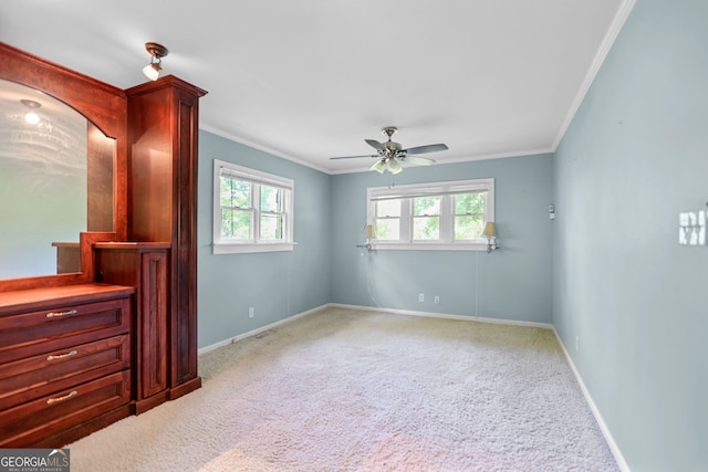 482 E Lake Rd, Mcdonough, GA 30252 - unfurnished bedroom featuring baseboards, crown molding, carpet flooring, and visible vents