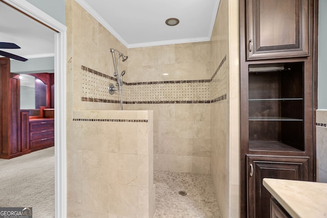482 E Lake Rd, Mcdonough, GA 30252 - bathroom with ceiling fan, ornamental molding, vanity, and a walk in shower