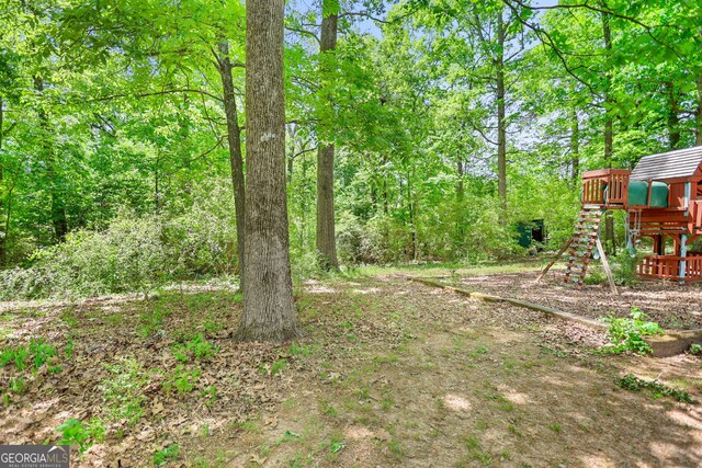 482 E Lake Rd, Mcdonough, GA 30252 - view of yard with a playground