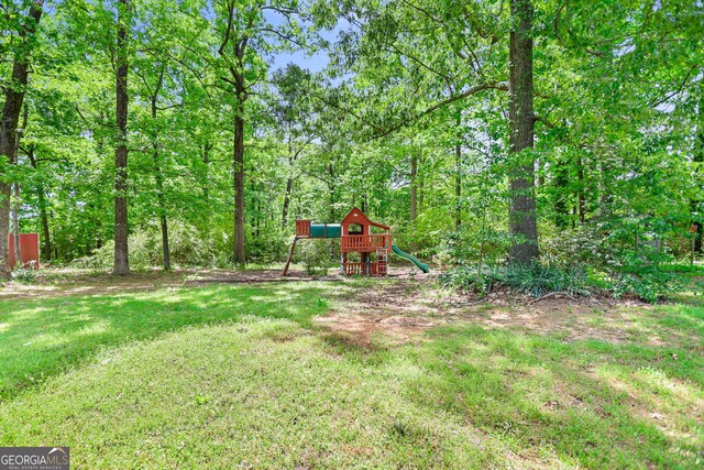482 E Lake Rd, Mcdonough, GA 30252 - view of yard featuring a playground