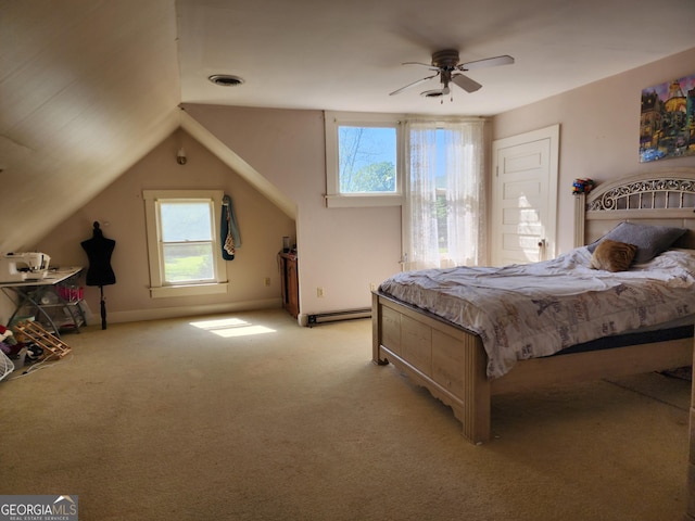 bedroom featuring lofted ceiling, light carpet, visible vents, and multiple windows