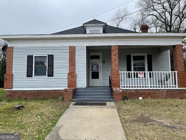 bungalow-style house featuring covered porch