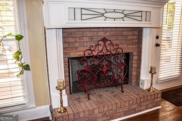 2319 Lochinver Ln SW, Conyers, GA 30094 - detailed view of a fireplace and wood finished floors