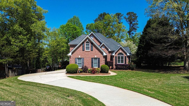 2319 Lochinver Ln SW, Conyers, GA 30094 - view of front of house with brick siding and driveway