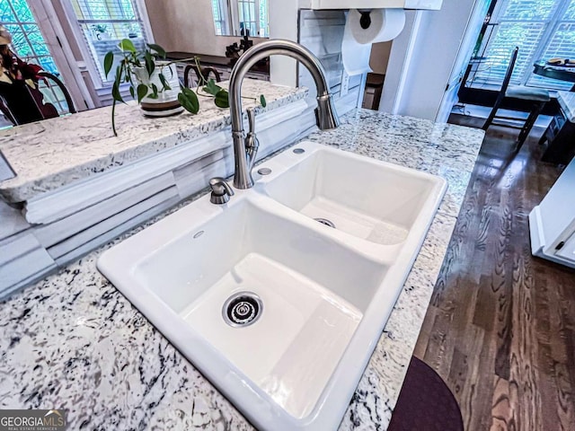 2319 Lochinver Ln SW, Conyers, GA 30094 - kitchen view of a sink and light stone countertops