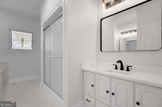 bathroom featuring a shower stall, crown molding, marble finish floor, and vanity