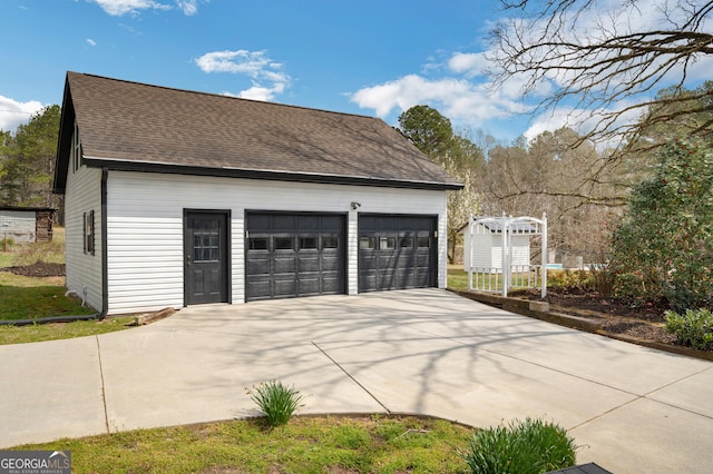 view of detached garage