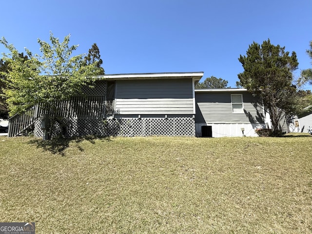 750 Six Flags Rd Lot 417, Austell, GA 30168 - view of side of home featuring a yard
