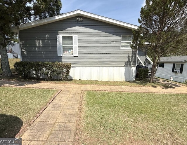 750 Six Flags Rd Lot 417, Austell, GA 30168 - view of side of home featuring a yard
