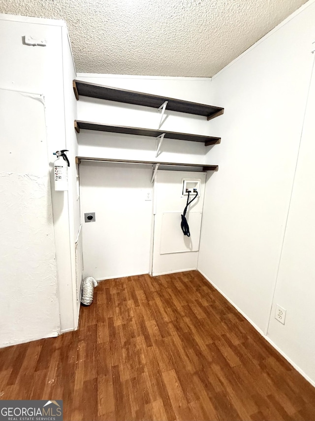 750 Six Flags Rd Lot 417, Austell, GA 30168 - laundry area with hookup for an electric dryer, a textured ceiling, wood finished floors, and hookup for a washing machine