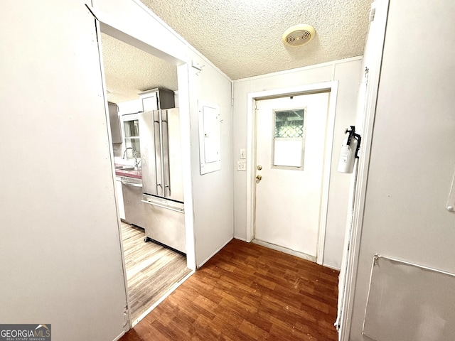 750 Six Flags Rd Lot 417, Austell, GA 30168 - doorway to outside featuring a textured ceiling, wood finished floors, a sink, and electric panel