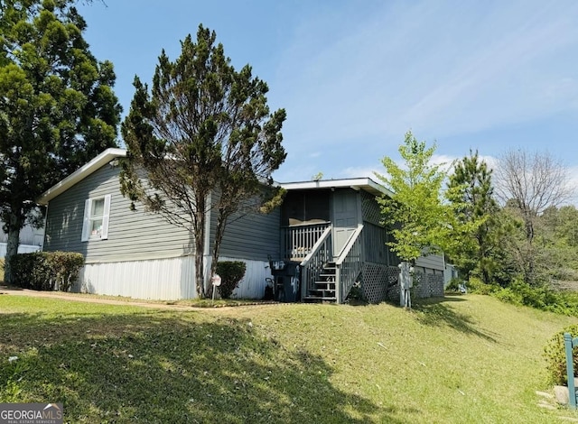 750 Six Flags Rd Lot 417, Austell, GA 30168 - back of house featuring a yard