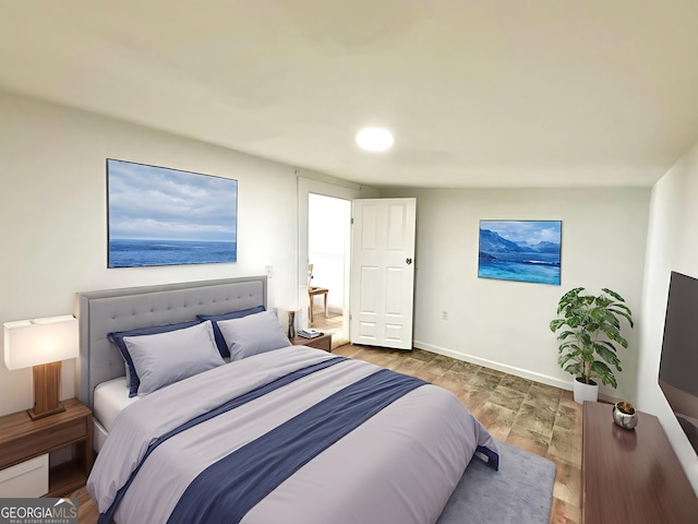 750 Six Flags Rd Lot 417, Austell, GA 30168 - bedroom featuring baseboards and wood finished floors