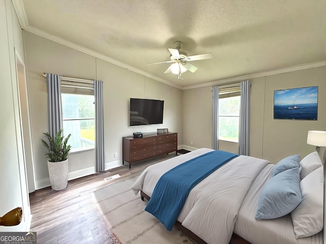 750 Six Flags Rd Lot 417, Austell, GA 30168 - bedroom with vaulted ceiling, wood finished floors, multiple windows, ornamental molding, and baseboards