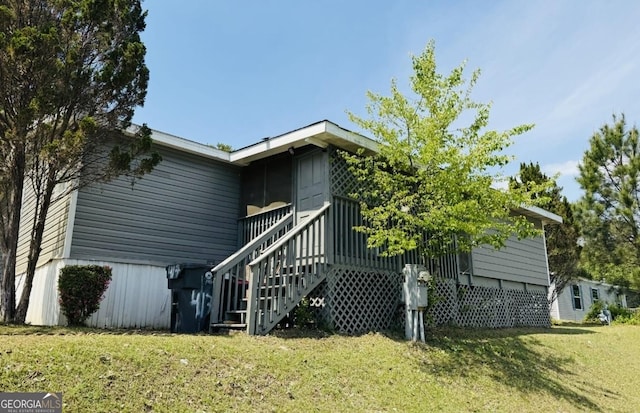750 Six Flags Rd Lot 417, Austell, GA 30168 - rear view of property with a lawn, stairs, and a deck