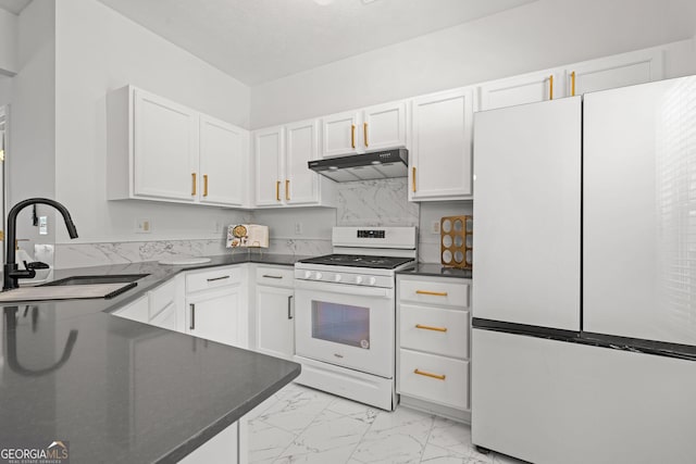 112 Timber Mist Ln, Lawrenceville, GA 30045 - kitchen with white cabinets, a sink, white appliances, under cabinet range hood, and marble finish floor