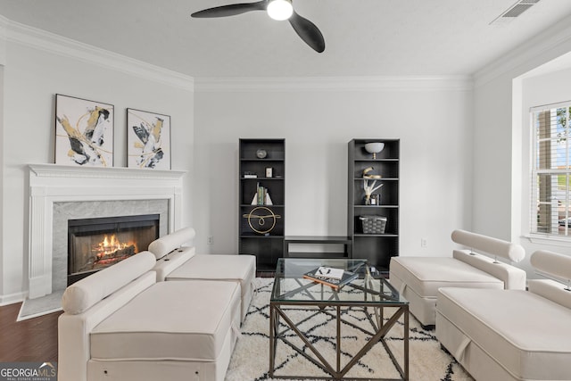 112 Timber Mist Ln, Lawrenceville, GA 30045 - living area featuring visible vents, ornamental molding, a ceiling fan, and wood finished floors