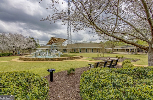 surrounding community with a yard