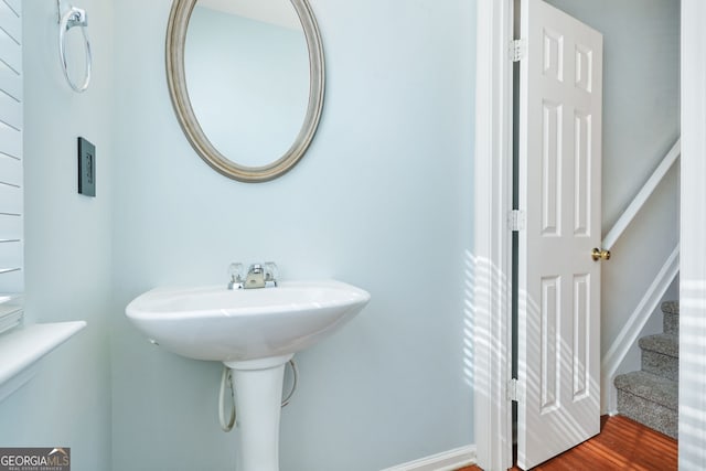 bathroom featuring wood finished floors