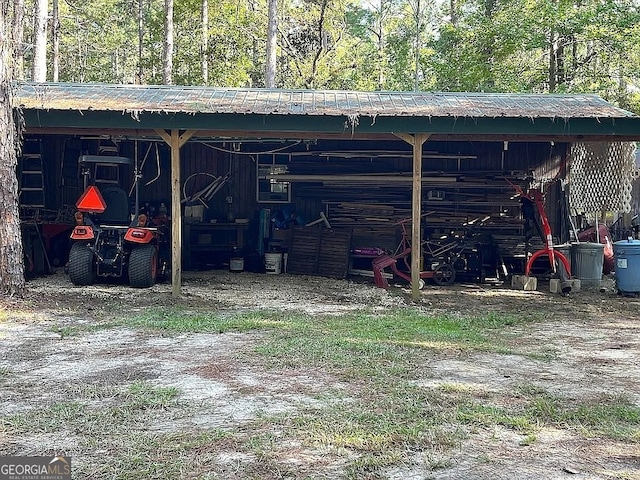 135 Southlake Dr, Moultrie, GA 31768 - view of pole building featuring a carport