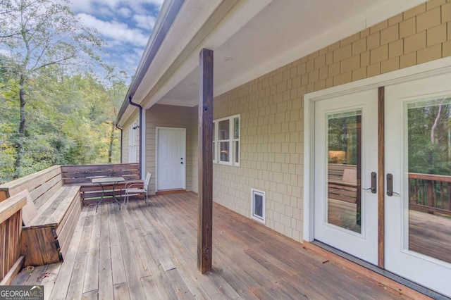 wooden terrace with french doors