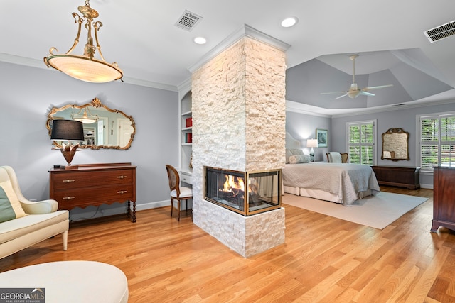 6140 Rachel Rdg, Peachtree Corners, GA 30092 - bedroom with wood finished floors, crown molding, a multi sided fireplace, baseboards, and recessed lighting