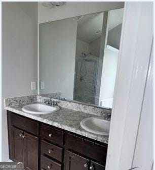 191 Amelia Dr, Byron, GA 31008 - full bath with double vanity and a stall shower