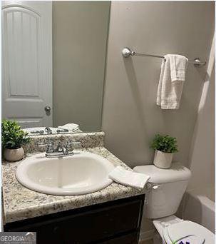 191 Amelia Dr, Byron, GA 31008 - full bath with vanity, toilet, and a tub to relax in
