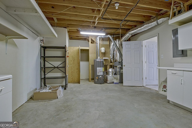 unfinished below grade area with water heater, heating unit, and electric panel