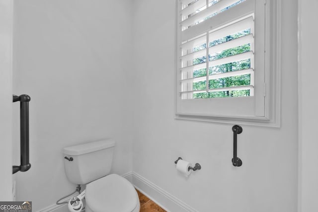 1021 Homestead, Greensboro, GA 30642 - bathroom featuring toilet and baseboards