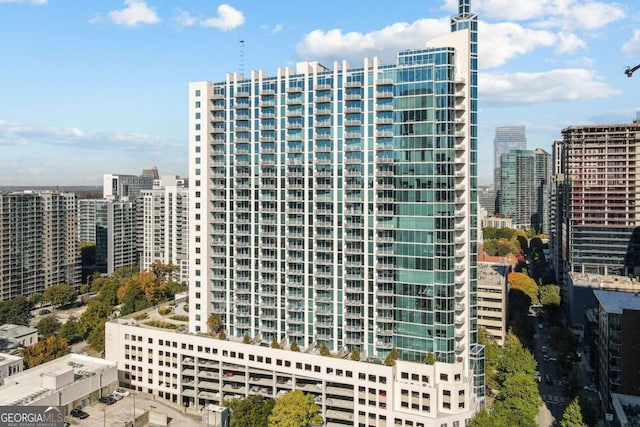 view of building exterior featuring a city view