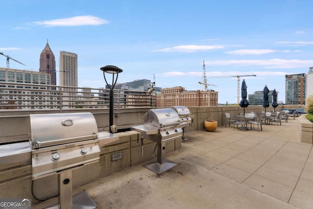 view of patio featuring a city view