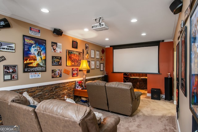 carpeted cinema room with crown molding and recessed lighting