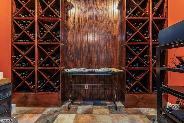 wine cellar featuring stone finish floor