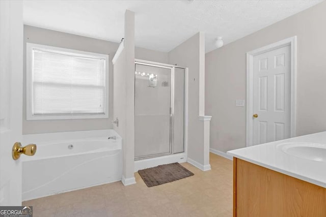 200 Arrowhead Ln, Canton, GA 30114 - full bath with a shower stall, a bath, vanity, and baseboards